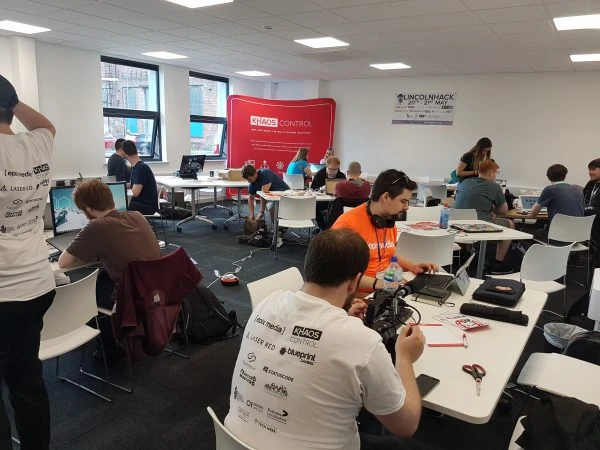 room people working on computers