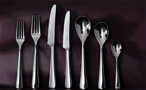 Cutlery laid out in size order