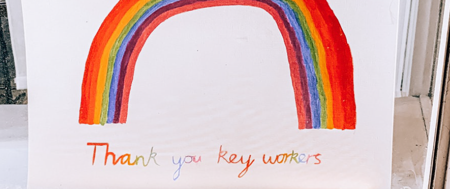 A child's painting of a rainbow with the words Thank you key workers below it