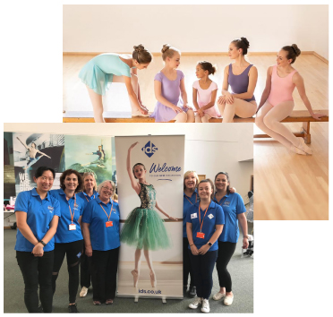 Girls practicing ballet and a group of IDS staff