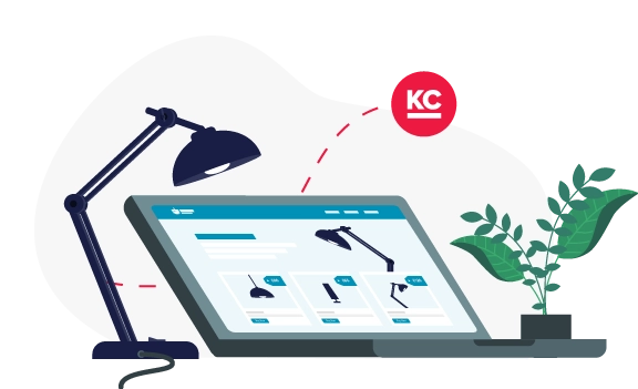 A laptop showing an ecommerce website with a plant and desk lamp next to it