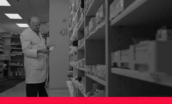 Pharmacist examining a prescription