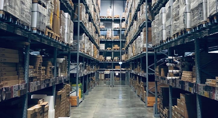 An image of warehouse shelves with boxes on them