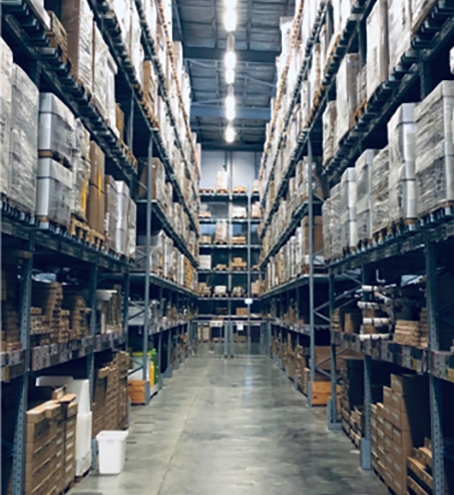 An image of warehouse shelves with boxes on them