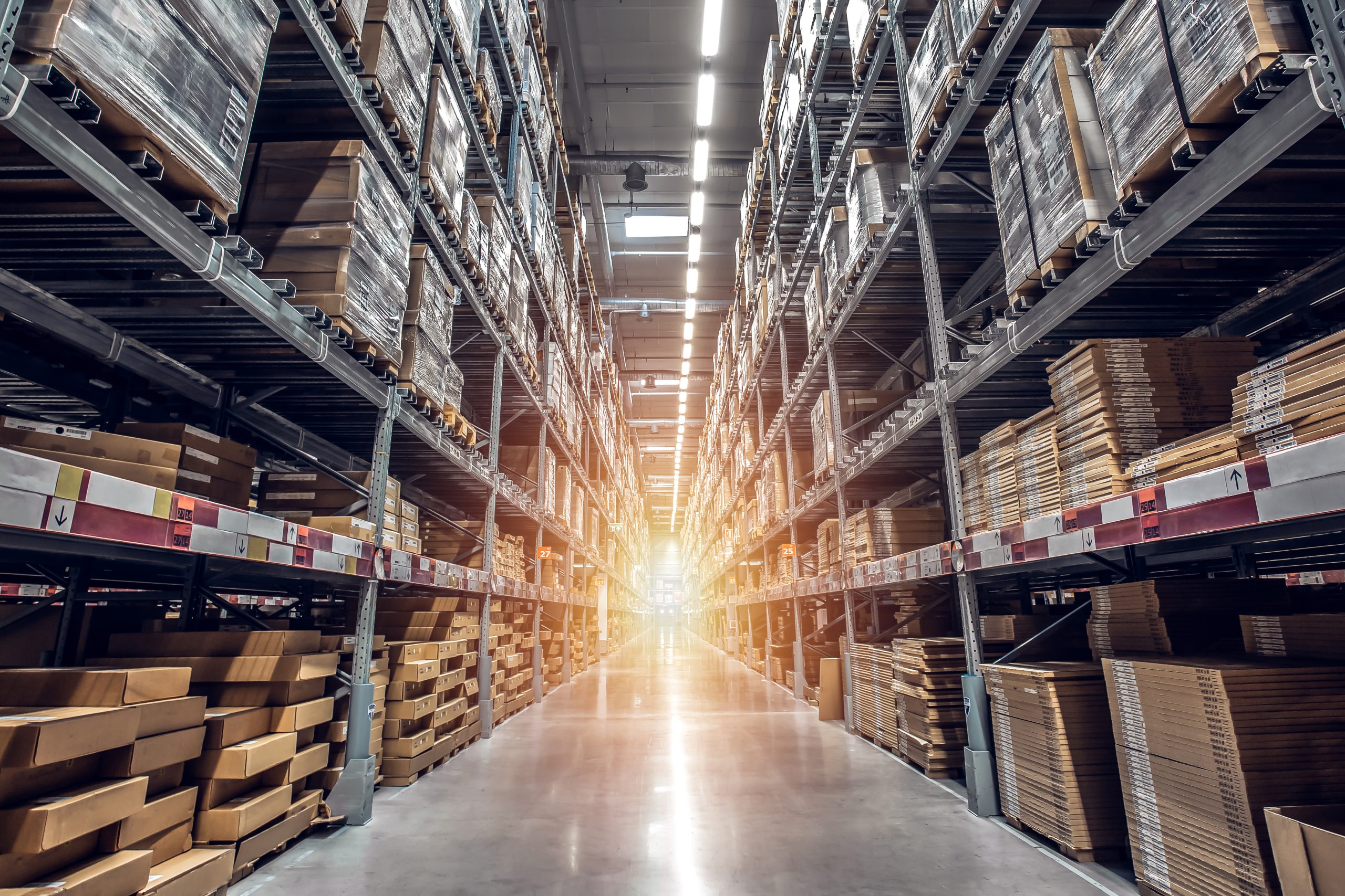 warehouse interior with shelves, pallets and boxes
