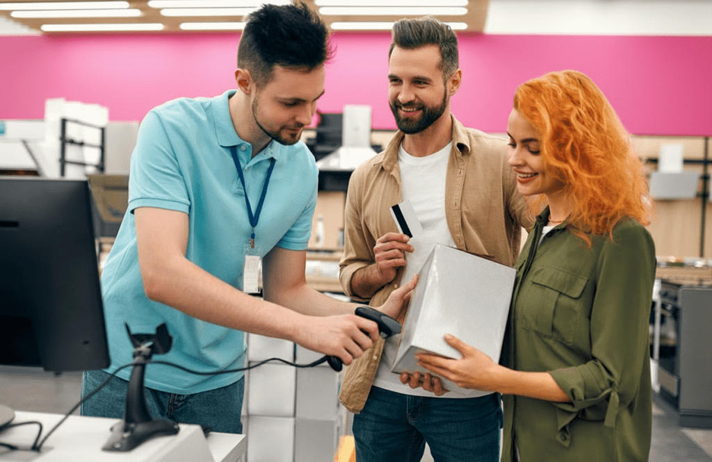 Three people at the Epos machine