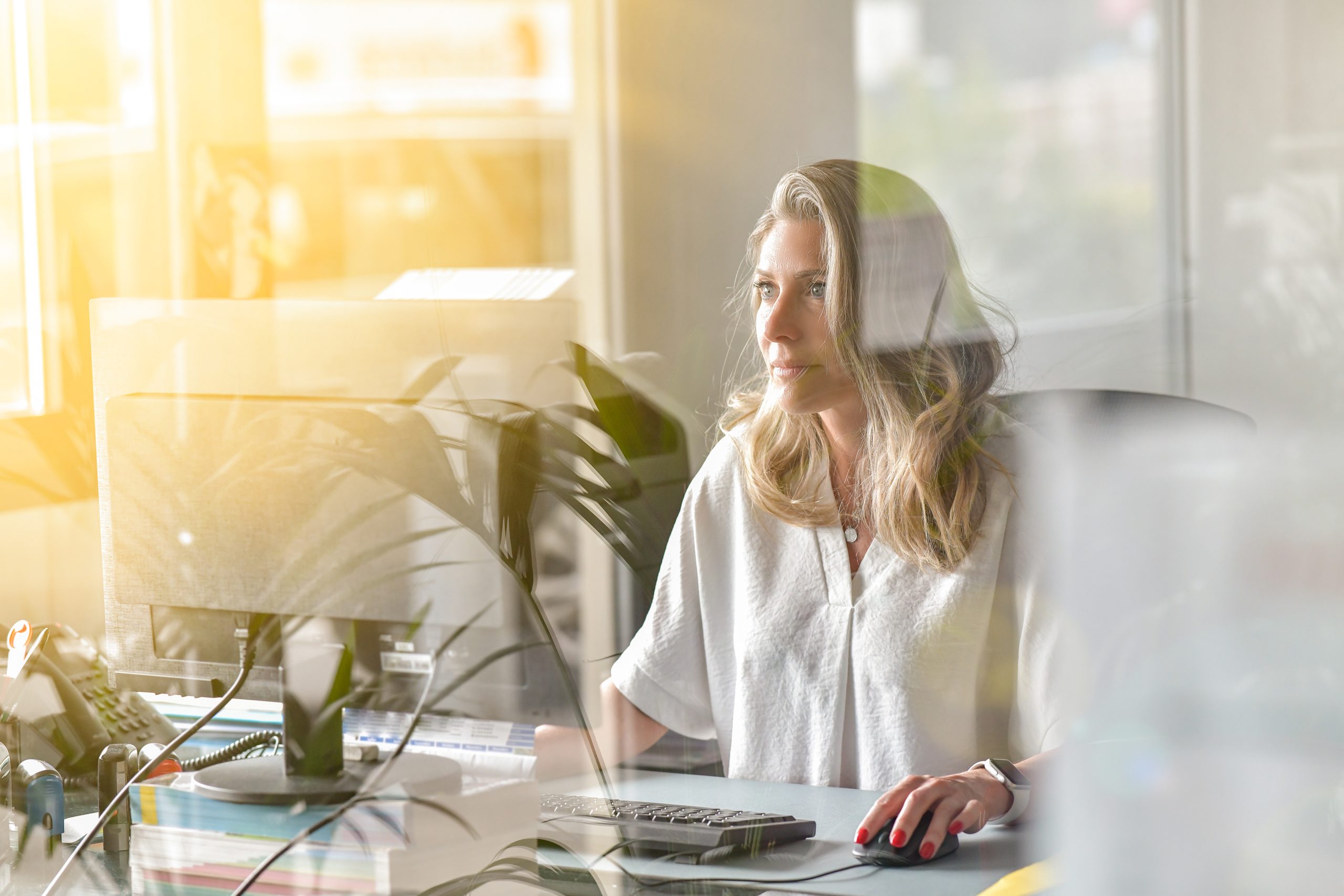 Business woman working at her desk