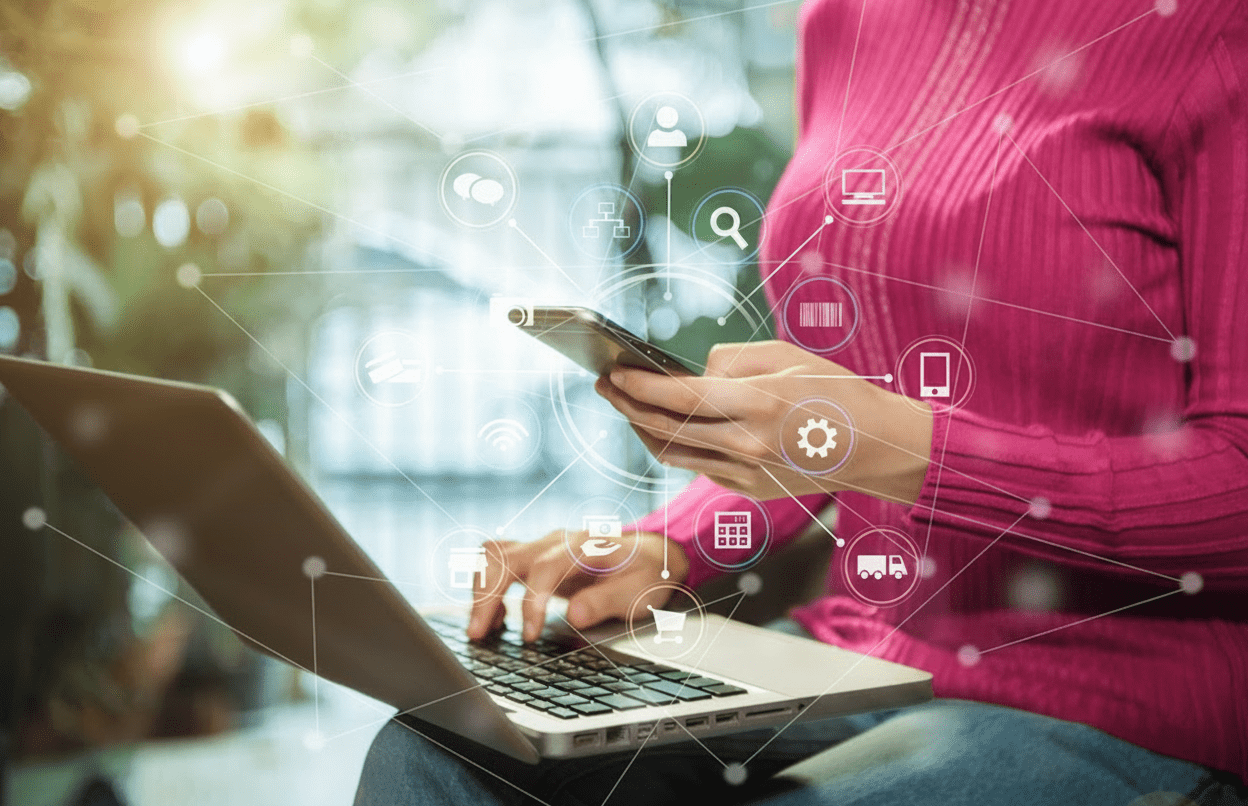 Omnichannel graphic, overlaying a woman in a pink jumper using her Mobile and Laptop on her knee. 