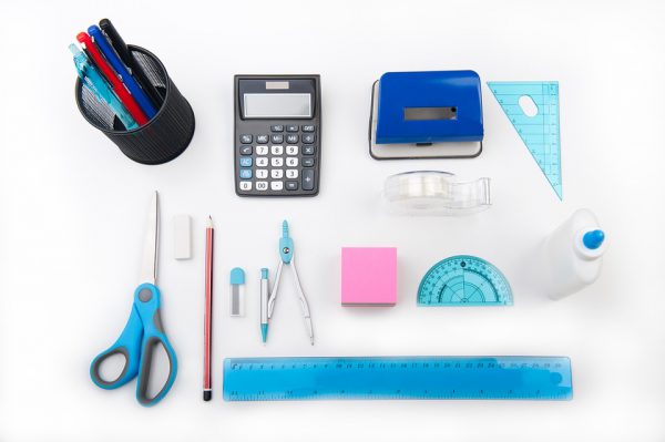 Stationary laid out on a white background.