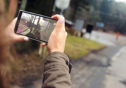 A person taking a picture using a mobile phone